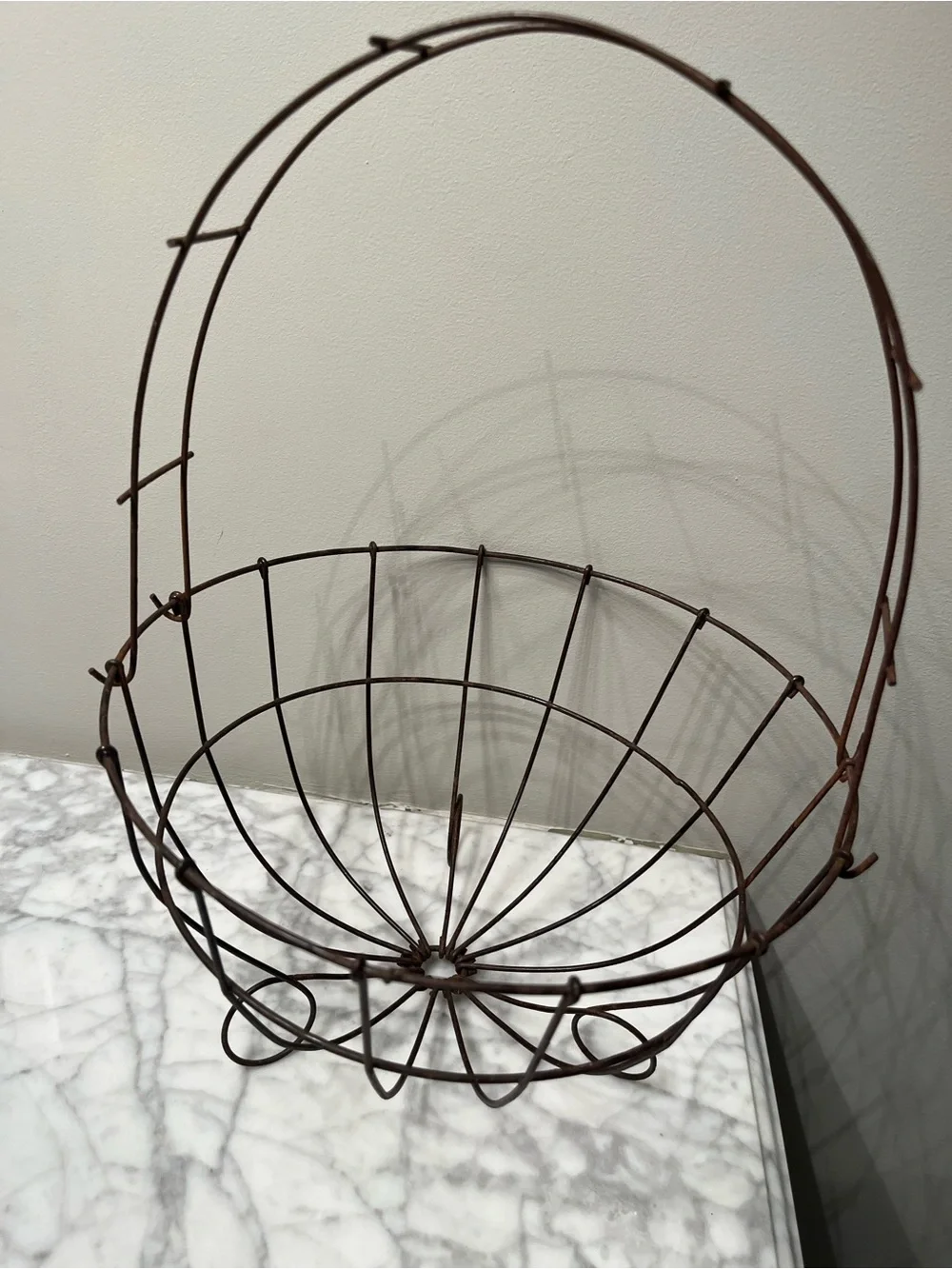 Vintage french style round wire gathering basket.